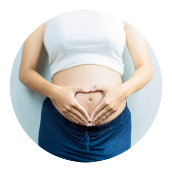 Pregnant Woman Meditating in Lotus Position